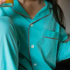 Issimo X Schostal Unisex Pyjama - Turquoise & Orange